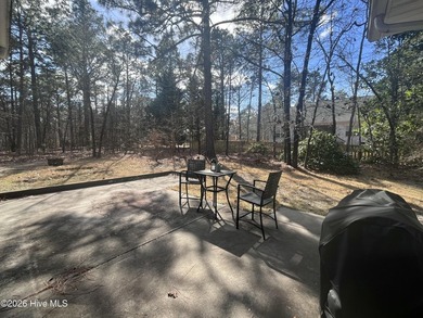 Welcome to your charming all-brick ranch, perfectly situated on on Woodlake Country Club in North Carolina - for sale on GolfHomes.com, golf home, golf lot