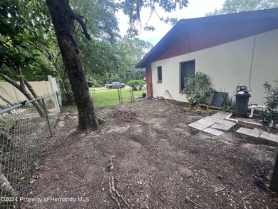 Come a see this great 3/2 Pool Home in the very desirable Citrus on Citrus Springs Country Club in Florida - for sale on GolfHomes.com, golf home, golf lot