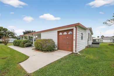 Come take a look at this well maintained home in The Villages at on Silver Lake Executive Golf Course in Florida - for sale on GolfHomes.com, golf home, golf lot