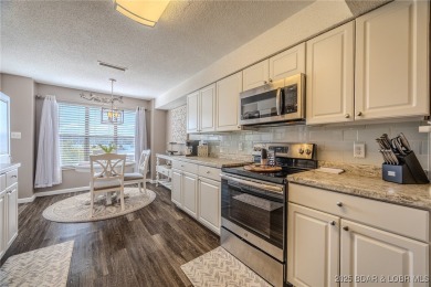 Unbelievably Gorgeous Condo! Step inside this warm, welcoming, & on Seasons Ridge At Four Seasons in Missouri - for sale on GolfHomes.com, golf home, golf lot
