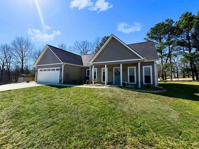 A rare opportunity to own a 2024 custom home overlooking the #12 on Cherokee Village South Course in Arkansas - for sale on GolfHomes.com, golf home, golf lot