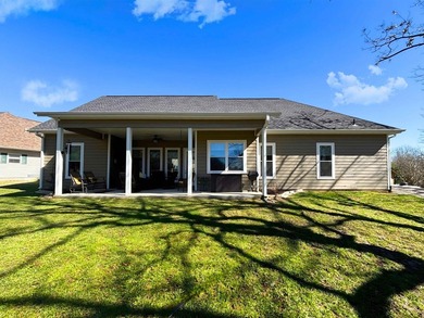 A rare opportunity to own a 2024 custom home overlooking the #12 on Cherokee Village South Course in Arkansas - for sale on GolfHomes.com, golf home, golf lot