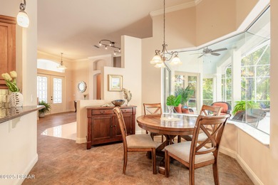 Experience refined living in this move-in ready golf course home on Halifax Plantation Golf Club in Florida - for sale on GolfHomes.com, golf home, golf lot