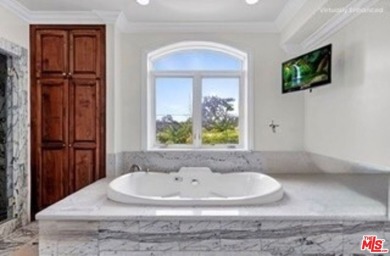 Welcome to this exceptional 7BD/6.5BA custom-built estate in on Rancho Park Golf Course in California - for sale on GolfHomes.com, golf home, golf lot