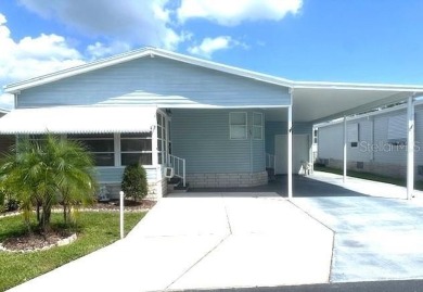 LOVELY WELL MAINTAINED 2 BEDROOM 2 BATH MANUFACTURED HOME on Lily Lake Golf and RV Resort in Florida - for sale on GolfHomes.com, golf home, golf lot