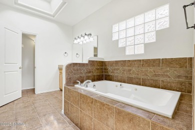 Discover your dream home in this charming three-bedroom on Sonoma Ranch Golf Course in New Mexico - for sale on GolfHomes.com, golf home, golf lot