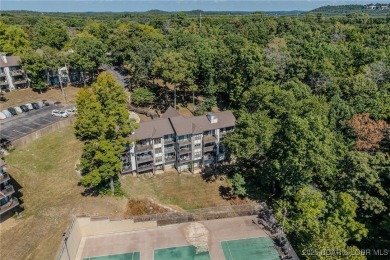 Unbelievably Gorgeous Condo! Step inside this warm, welcoming, & on Seasons Ridge At Four Seasons in Missouri - for sale on GolfHomes.com, golf home, golf lot