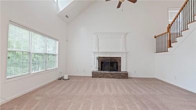 Discover this beautifully maintained 5-bedroom, 3.5 bath home on Summergrove Golf Club in Georgia - for sale on GolfHomes.com, golf home, golf lot