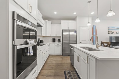 Welcome to 5206 Double Eagle Way! Step inside to this stunning on Barefoot Resort and Golf Club  in South Carolina - for sale on GolfHomes.com, golf home, golf lot