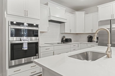 Welcome to 5206 Double Eagle Way! Step inside to this stunning on Barefoot Resort and Golf Club  in South Carolina - for sale on GolfHomes.com, golf home, golf lot