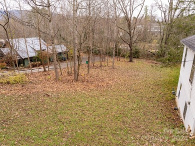 Explore this lovely residential building lot in downtown Black on Black Mountain Golf Course in North Carolina - for sale on GolfHomes.com, golf home, golf lot