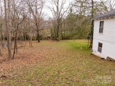 Explore this lovely residential building lot in downtown Black on Black Mountain Golf Course in North Carolina - for sale on GolfHomes.com, golf home, golf lot