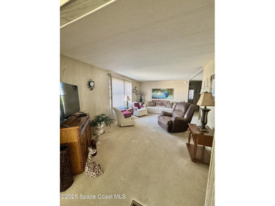 Welcome to the vibrant Barefoot Bay community! This 2-bedroom on Barefoot Bay Golf Course in Florida - for sale on GolfHomes.com, golf home, golf lot