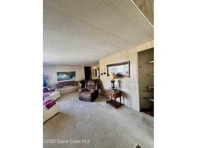 Welcome to the vibrant Barefoot Bay community! This 2-bedroom on Barefoot Bay Golf Course in Florida - for sale on GolfHomes.com, golf home, golf lot