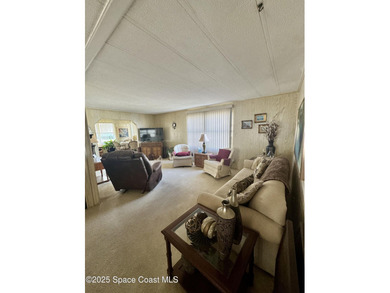 Welcome to the vibrant Barefoot Bay community! This 2-bedroom on Barefoot Bay Golf Course in Florida - for sale on GolfHomes.com, golf home, golf lot