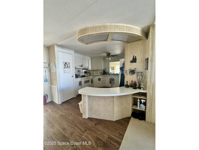 Welcome to the vibrant Barefoot Bay community! This 2-bedroom on Barefoot Bay Golf Course in Florida - for sale on GolfHomes.com, golf home, golf lot