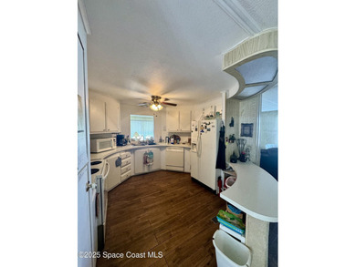 Welcome to the vibrant Barefoot Bay community! This 2-bedroom on Barefoot Bay Golf Course in Florida - for sale on GolfHomes.com, golf home, golf lot