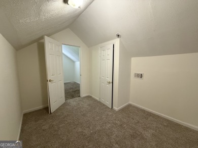 Discover modern comfort in this beautifully renovated home on John A. White Golf Course in Georgia - for sale on GolfHomes.com, golf home, golf lot