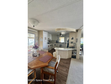 Welcome to the vibrant Barefoot Bay community! This 2-bedroom on Barefoot Bay Golf Course in Florida - for sale on GolfHomes.com, golf home, golf lot