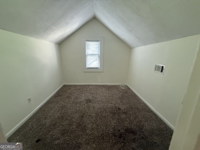 Discover modern comfort in this beautifully renovated home on John A. White Golf Course in Georgia - for sale on GolfHomes.com, golf home, golf lot
