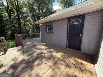 Discover modern comfort in this beautifully renovated home on John A. White Golf Course in Georgia - for sale on GolfHomes.com, golf home, golf lot