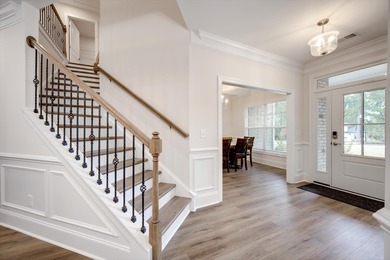 Experience timeless elegance and resort-style living in this on Mount Vintage Plantation and Golf Club  in South Carolina - for sale on GolfHomes.com, golf home, golf lot