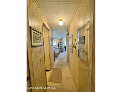 Welcome to the vibrant Barefoot Bay community! This 2-bedroom on Barefoot Bay Golf Course in Florida - for sale on GolfHomes.com, golf home, golf lot