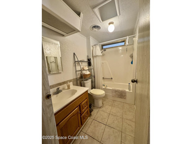 Welcome to the vibrant Barefoot Bay community! This 2-bedroom on Barefoot Bay Golf Course in Florida - for sale on GolfHomes.com, golf home, golf lot