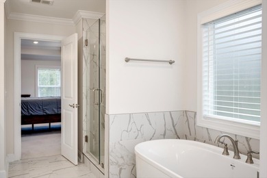 Experience timeless elegance and resort-style living in this on Mount Vintage Plantation and Golf Club  in South Carolina - for sale on GolfHomes.com, golf home, golf lot