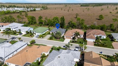 Welcome to this beautiful 2-bedroom, 2-bathroom home located in on Herons Glen Golf and Country Club in Florida - for sale on GolfHomes.com, golf home, golf lot