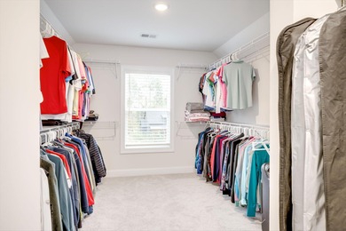 Experience timeless elegance and resort-style living in this on Mount Vintage Plantation and Golf Club  in South Carolina - for sale on GolfHomes.com, golf home, golf lot