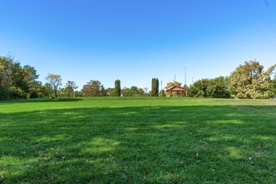 Beautifully located Tartan Fields home situated across from the on Tartan Fields Golf Club in Ohio - for sale on GolfHomes.com, golf home, golf lot