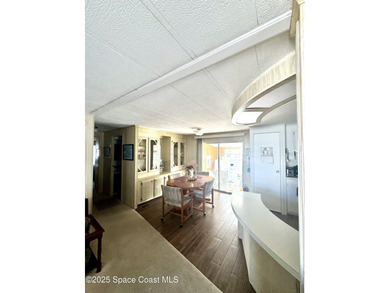 Welcome to the vibrant Barefoot Bay community! This 2-bedroom on Barefoot Bay Golf Course in Florida - for sale on GolfHomes.com, golf home, golf lot