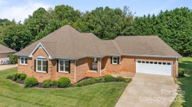 Welcome to this beautifully updated 3-bedroom, 2-bath brick on Mallard Head Country Club in North Carolina - for sale on GolfHomes.com, golf home, golf lot