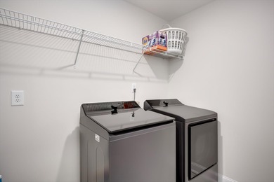 Experience timeless elegance and resort-style living in this on Mount Vintage Plantation and Golf Club  in South Carolina - for sale on GolfHomes.com, golf home, golf lot