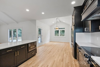 Welcome to this beautifully updated 3-bedroom, 2-bath brick on Mallard Head Country Club in North Carolina - for sale on GolfHomes.com, golf home, golf lot