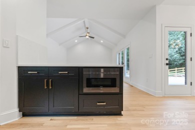 Welcome to this beautifully updated 3-bedroom, 2-bath brick on Mallard Head Country Club in North Carolina - for sale on GolfHomes.com, golf home, golf lot