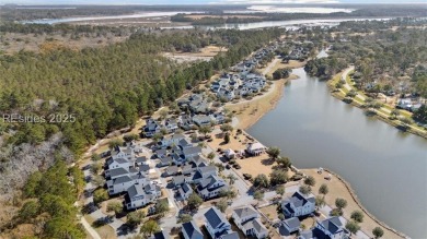 Nestled in the exclusive gated community of Oldfield, 5 Caspian on Oldfield Golf Club in South Carolina - for sale on GolfHomes.com, golf home, golf lot