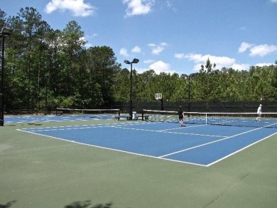 Lovely, well-treed home site with a front to back topography in on The Golf Club At Cedar Creek in South Carolina - for sale on GolfHomes.com, golf home, golf lot