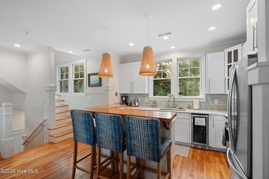 Located on a high homesite overlooking the 13th tee of the Bald on Bald Head Island Golf Club in North Carolina - for sale on GolfHomes.com, golf home, golf lot