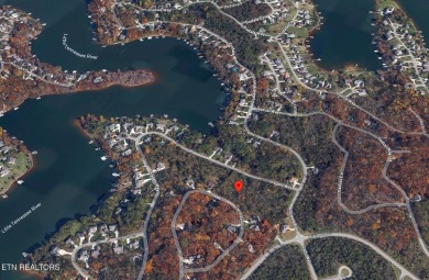 Located at 242 Mialaquo Circle, this vacant lot in Tellico on Tellico Village Golf Club in Tennessee - for sale on GolfHomes.com, golf home, golf lot