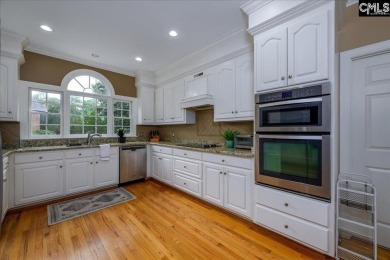 This stylish custom home with its welcoming front porch sits in on The Wildewood Country Club in South Carolina - for sale on GolfHomes.com, golf home, golf lot
