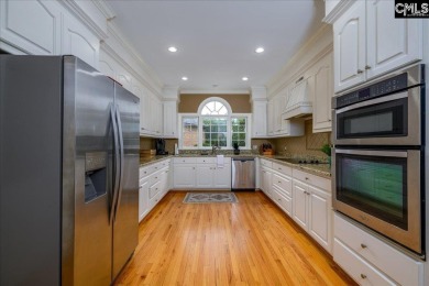 This stylish custom home with its welcoming front porch sits in on The Wildewood Country Club in South Carolina - for sale on GolfHomes.com, golf home, golf lot