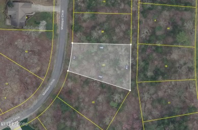 Located at 242 Mialaquo Circle, this vacant lot in Tellico on Tellico Village Golf Club in Tennessee - for sale on GolfHomes.com, golf home, golf lot