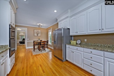 This stylish custom home with its welcoming front porch sits in on The Wildewood Country Club in South Carolina - for sale on GolfHomes.com, golf home, golf lot