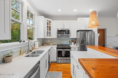 Located on a high homesite overlooking the 13th tee of the Bald on Bald Head Island Golf Club in North Carolina - for sale on GolfHomes.com, golf home, golf lot