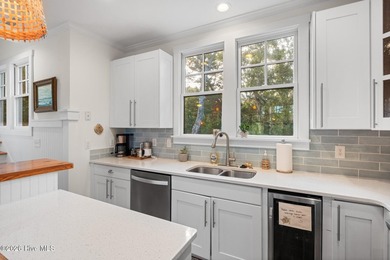 Located on a high homesite overlooking the 13th tee of the Bald on Bald Head Island Golf Club in North Carolina - for sale on GolfHomes.com, golf home, golf lot