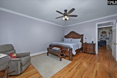 This stylish custom home with its welcoming front porch sits in on The Wildewood Country Club in South Carolina - for sale on GolfHomes.com, golf home, golf lot