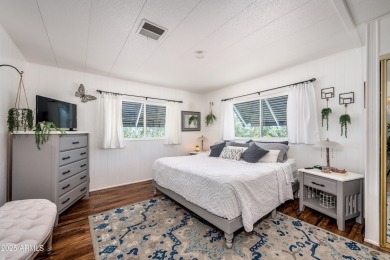 This charming and well-maintained, recently updated 2-bedroom on Fountain of the Sun Country Club in Arizona - for sale on GolfHomes.com, golf home, golf lot