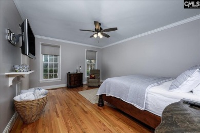This stylish custom home with its welcoming front porch sits in on The Wildewood Country Club in South Carolina - for sale on GolfHomes.com, golf home, golf lot